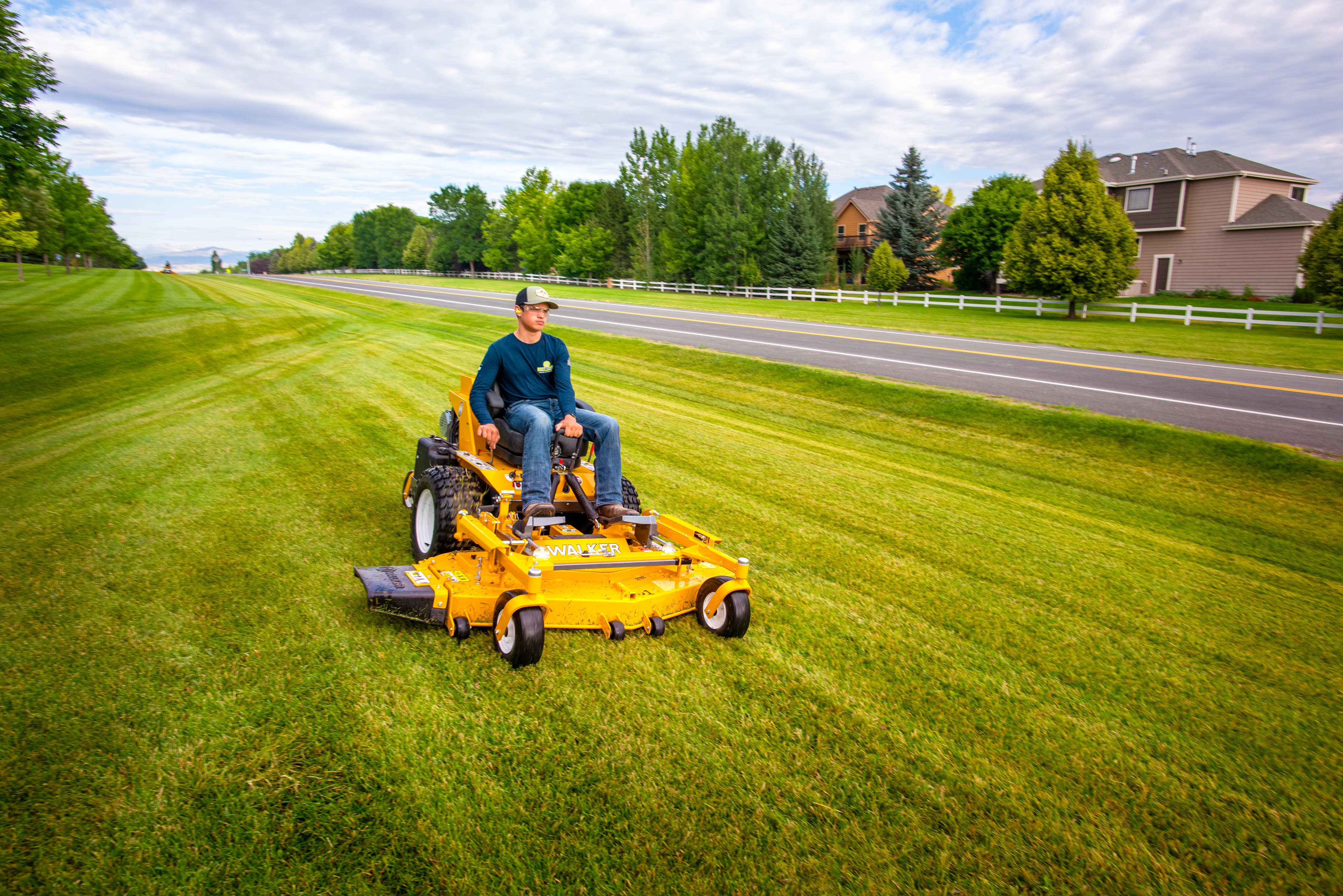 Walker H38i with 61-inch side-discharge deck mowing open turf